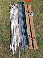 (2) Wooden Fence Stretchers,(11) Plastic Posts