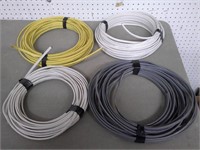 four partial wire rolls