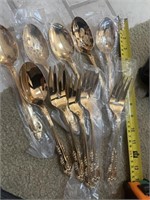 Oneida community gold, serving spoons and forks,