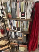 Collapsible bookshelf with magazines.
