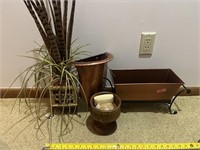 Copper planters with walnut bowl and decor.