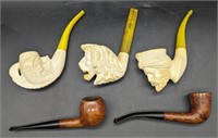 (JL) Meerschaum and other pipes. Each is 6" long.