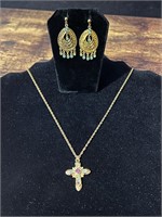 Matching gold colored earrings & necklace w/ gems