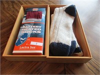 2 wooden boxes with socks