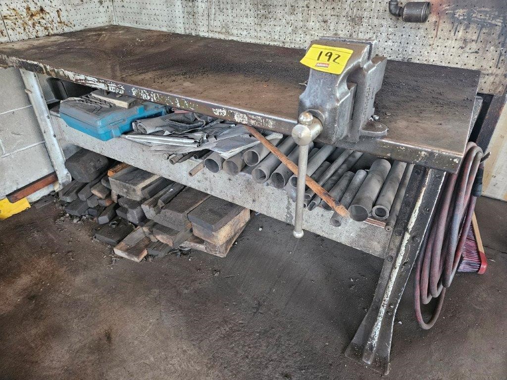 metal shop table with table vise and misc scrap