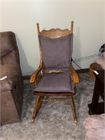 Rocking chair with brown cushions