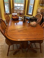 Dining table with six chairs items on and about