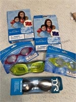 Swim goggles and floaty armbands