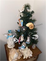 Small Christmas tree decorated with a beach