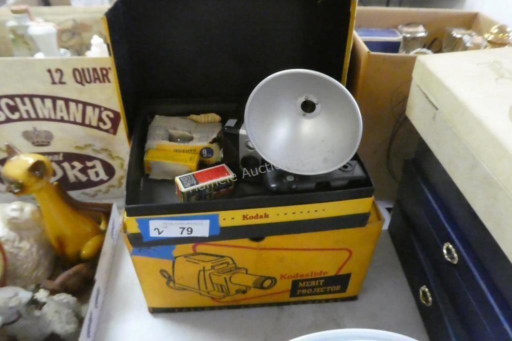 2 items - Kodak projector and Hawkeye Brownie came