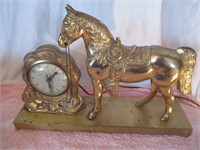 LOT 18 GOLD 1950'S HORSE CLOCK