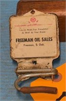 Freeman Oil sales broom holder