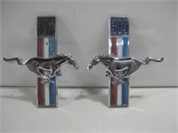 Two Ford Mustang Emblems