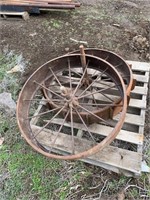 PALLET WITH 2 ANTIQUE SPOKED WHEELS