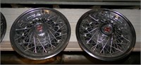 A set of 4 Chevy spoked wheel covers