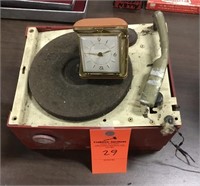 Old child’s record player and alarm clock