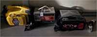 (2) Battery Chargers And Jump Box