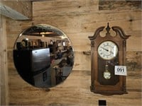 Howard Miller wall clock 26" d w/ round mirror