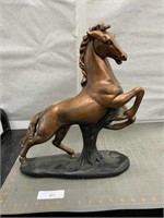 Painted bronze horse statue