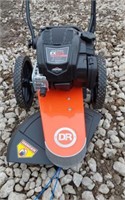 NEW- DR WALK BEHIND TRIMMER-
BRIGGS AND STRATTON