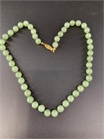 Beautiful light green jade bead necklace. Beads ar