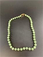 Beautiful light green jade bead necklace. Beads ar