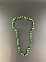 Alaskan Kobuk jade bead necklace. Each bead shows