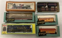 6 HO scale engines and cars in boxes