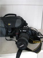 Nikon camera w/Tamron lens, and case