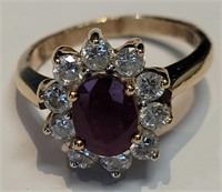 A ruby and diamond ring in 14k yellow gold