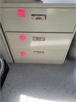 Tan filing cabinet