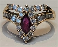 A diamond and ruby ring in 18k gold