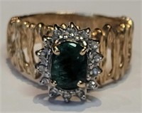 A green tourmaline and diamond ring 14k gold