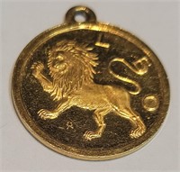 Leo zodiac sign pendant in 14k yellow gold