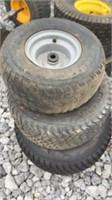 Three different size garden tractor tires