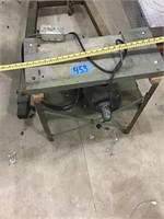 ELECTRIC MOTOR MOUNTED ON TABLE