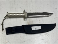 Knife includes sheath
