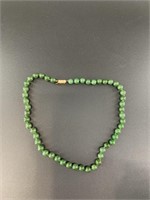 Alaskan Kobuk jade bead necklace. Each bead shows
