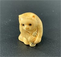 Antique mammoth netsuke of what may be a monkey? V