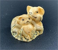 Antique mammoth netsuke of a mother pig and piglet