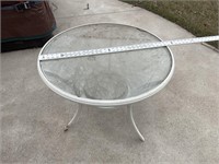 30 inch round table glass top with two chairs and