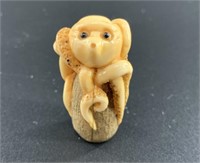Antique mammoth netsuke of a very expressive octop