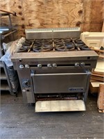 6 burner gas stove with oven unsure if works