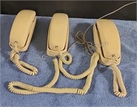 Pushbutton trimline phones