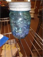 FLORAL FLAT MARBLES IN OLD BLUE JAR