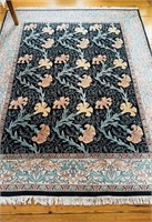 Large room size carpet, with full knotted fringe,