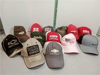 13 Hats, couple Chevys, huskers, case and more!