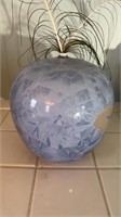 Sky blue porcelain vase, with a tiny hole in the