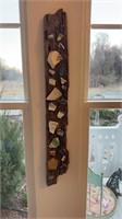 Old Barnwood wall display with antique pottery
