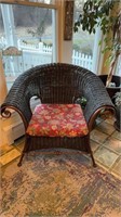Bronze metal wicker armchair, with a cushion